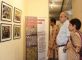 Visitors at inauguration of the photo-exhibition "A Farewell to Arms" on 20 September 2009 in New Delhi look at pictures of Javeed Shah from Kashmir