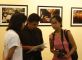 Impressions from the inauguration of the photo-exhibition "A Farewell to Arms" on 20 September 2009 in New Delhi. In the background are pictures of eminent photographer Raghu Rai taken in Manipur